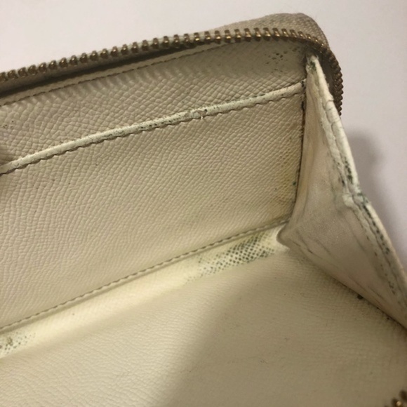 Coach debossed creamy white double zipper wristlet